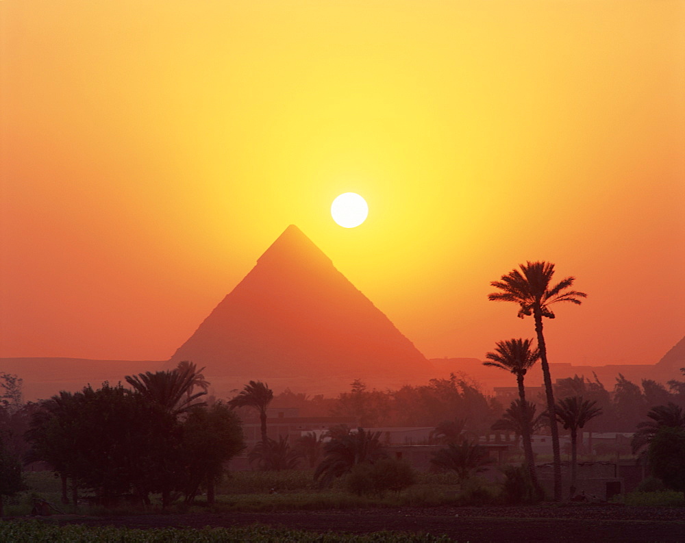 Pyramid silhouetted at sunset, Giza, UNESCO World Heritage Site, Cairo, Egypt, North Africa, Africa