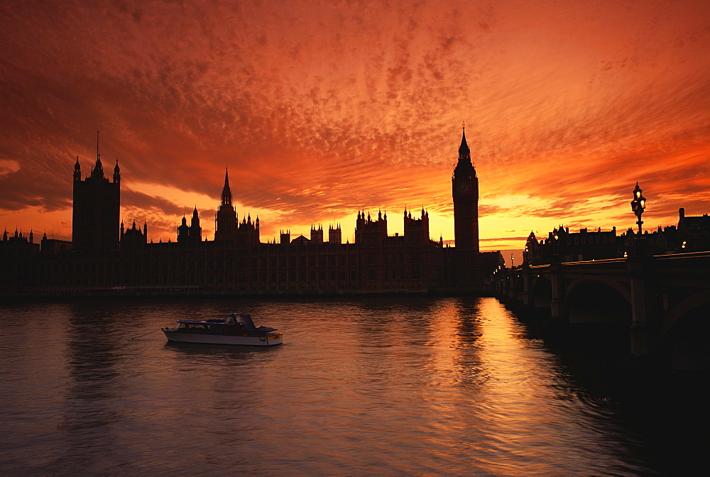 Sunset over the Houses of Parliament, UNESCO World Heritage Site, Westminster, from across the River Thames, London, England, United Kingdom, Europe