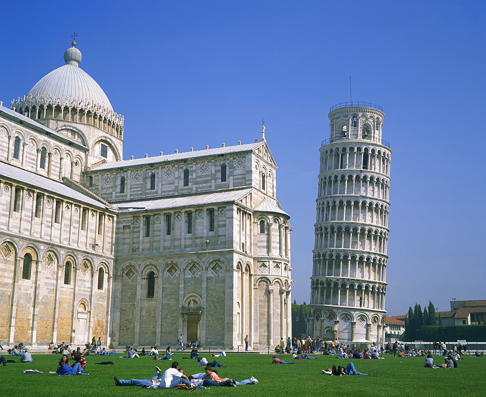 Tourists in the Piazza del Duomo near the Leaning Tower, UNESCO World Heritage Site, Pisa, Tuscany, Italy, Europe