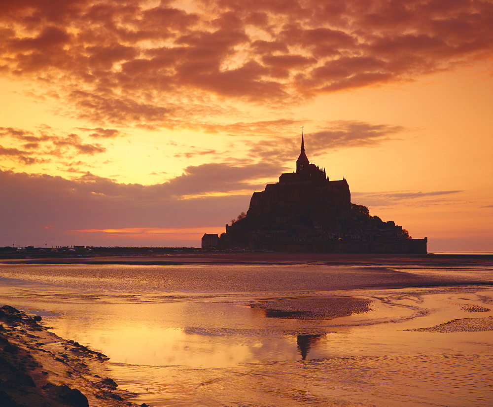 Mont Saint-Michel (Mont St. Michel) at sunset, La Manche region, Normandy, France, Europe