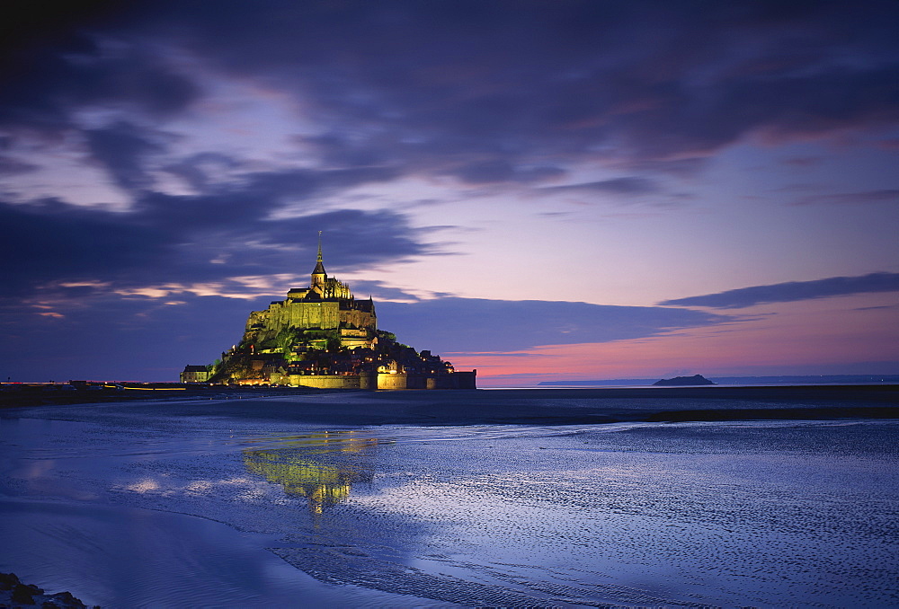 Mont St. Michel, UNESCO World Heritage Site, illuminated at dusk, La Manche region, Basse-Normandie, France, Europe