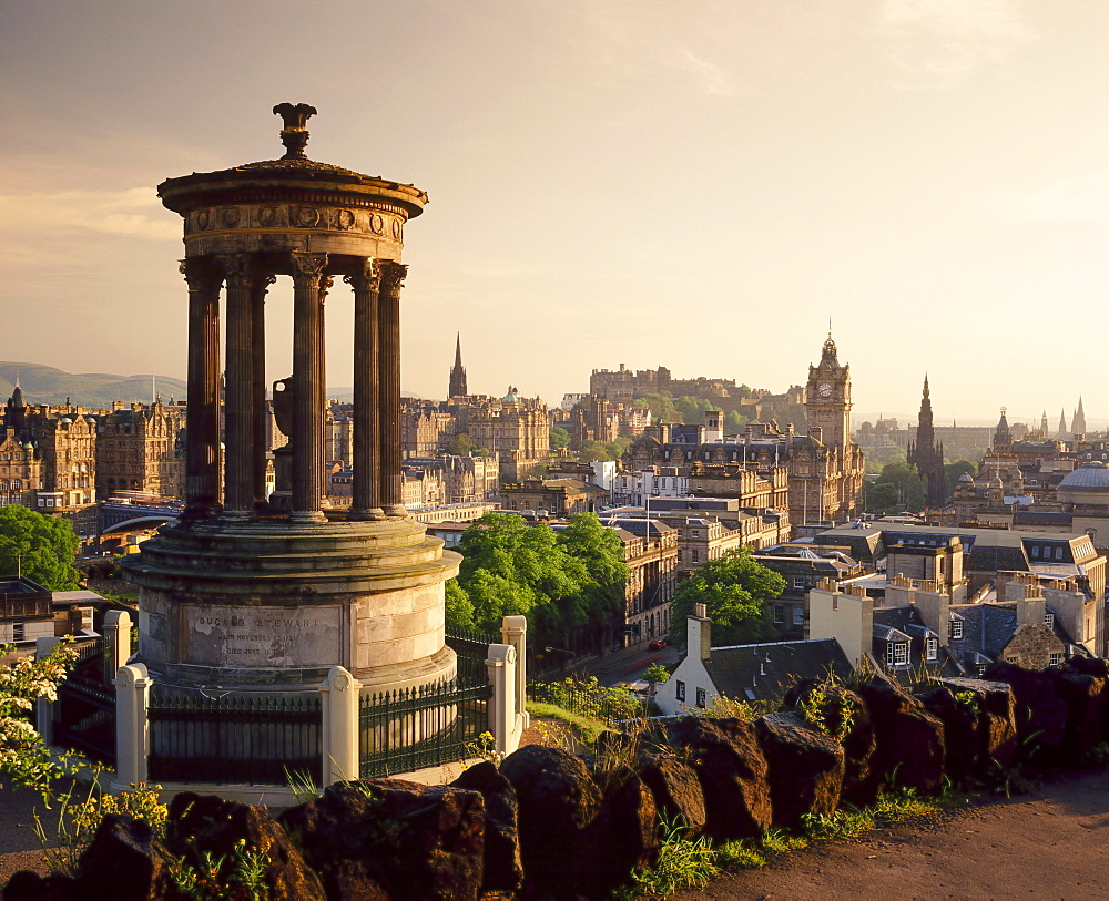 The Dugald Stewart Monument and view over Princes St. including the Waverley Hotel clock tower, Edinburgh, Lothian, Scotland, UK 