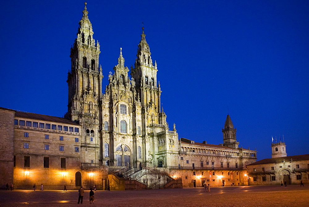 Facade of cathedral seen from Praza do Obradoiro floodlit at night, Santiago de Compostela, UNESCO World Heritage Site, Galicia, Spain, Europe