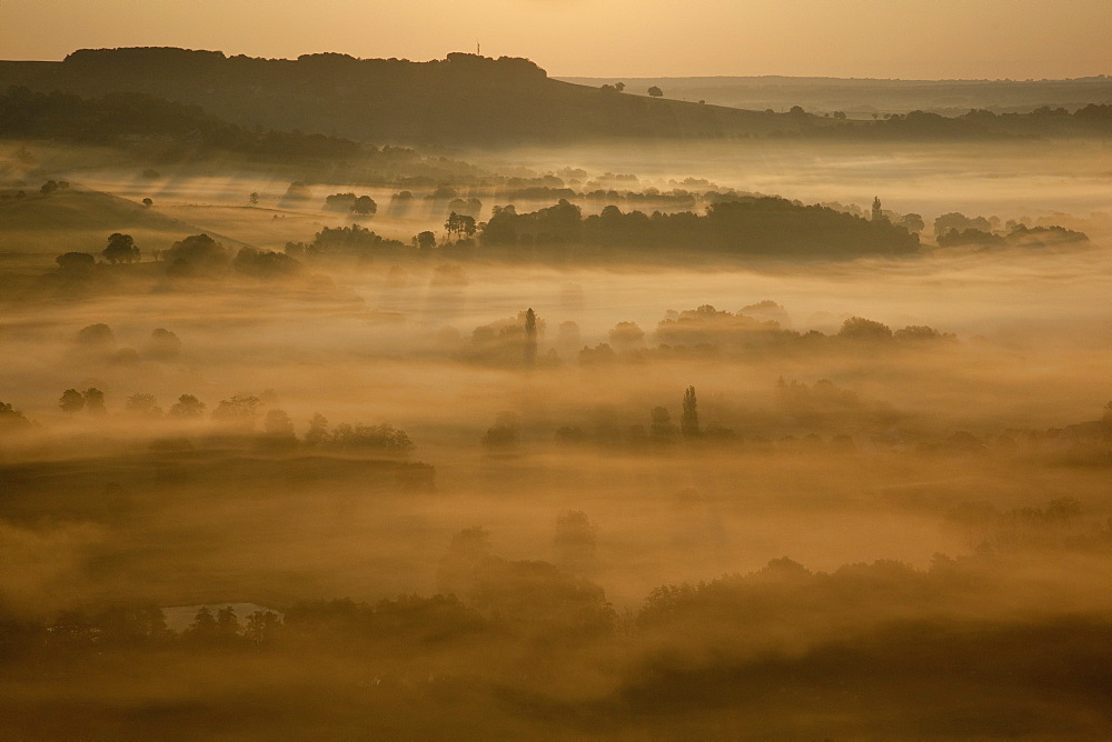 Sunrise over misty valley from the terrace, Vezelay, Burgundy, France, Europe