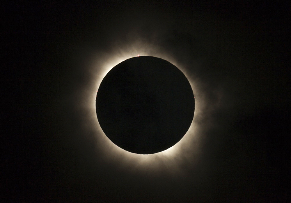 Total eclipse of the sun with solar flares visible, 13 November 2012 from Palm Cove, Cairns, North Queensland, Australia, Pacific