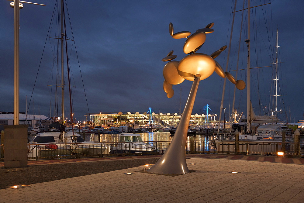 Cytoplasm sculpture by Phil Price at night, Viaduct Walkway, Viaduct Events Centre in background, Auckland, North Island, New Zealand, Pacific