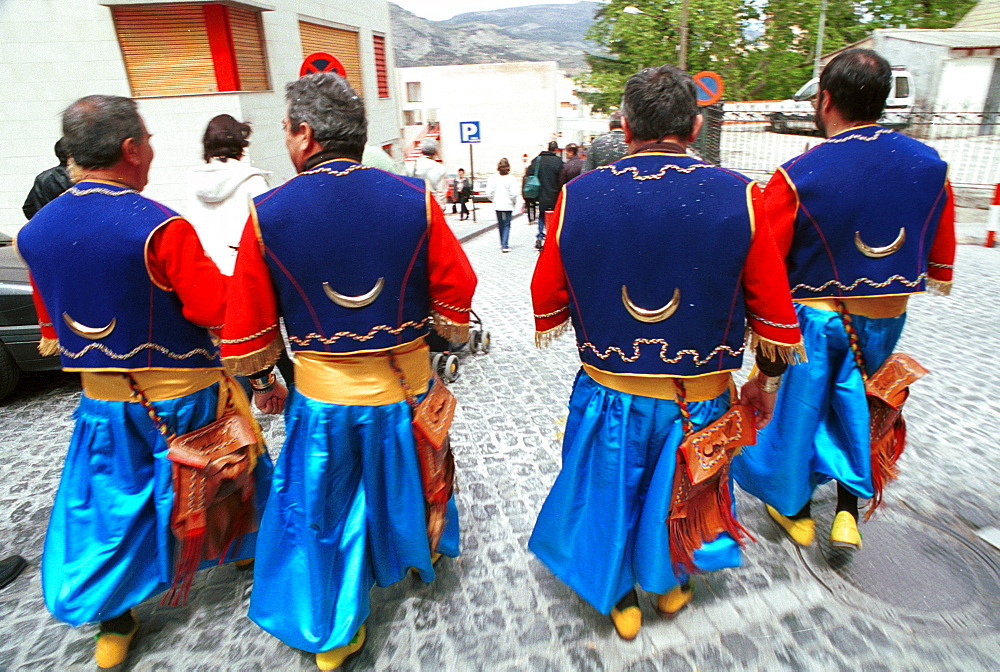 Alcoy,Alicante,Spain -  a quartet of Moors wearing the elaborate costumes,newly made each year, during the annual Moors and Christians celebrations