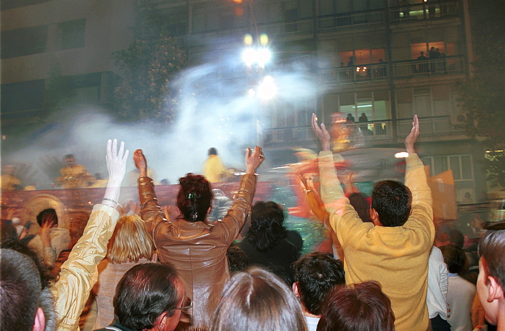 Murcia - Spain Spring Festivals - Burial of the Sardine Spectators reach out for gifts thrown from the floats 