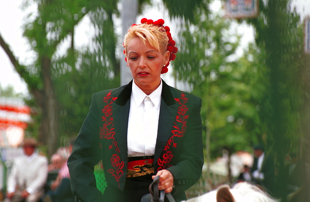 Seville - Spain - The Feria de Abril - Seville Fair - A horsewoman in the afternoon parade 