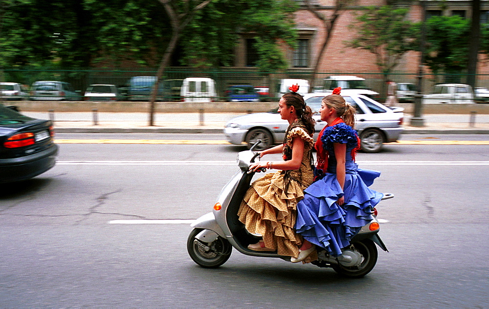 Seville - Spain - The Feria de Abril - Seville Fair - Travelling to the fair by scooter