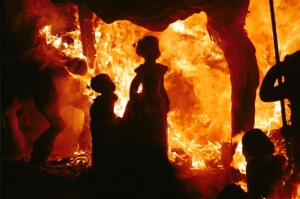 Valencia - Spain - Las Fallas Fiesta - Images in the flames at the burning of a small childrens ninot