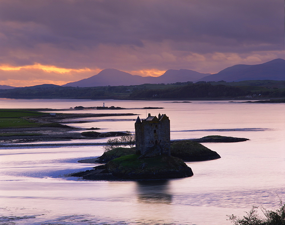 Castle Stalker on Loch Linnhe, silhouetted at dusk, Argyll, Scotland, United Kingdom, Europe