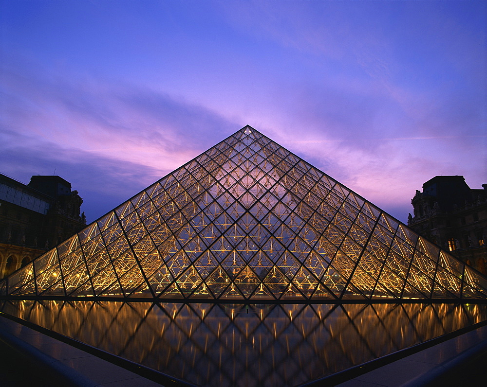 The Pyramide du Louvre illuminated at dusk, Musee du Lourve, Paris, France, Europe