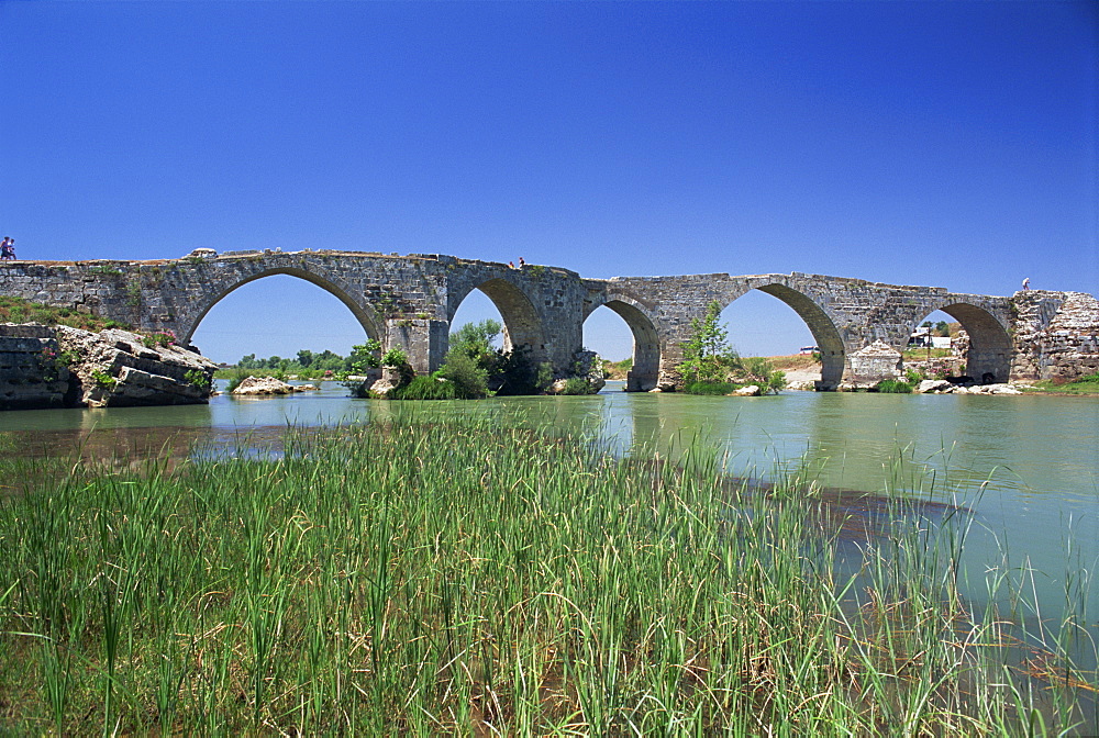 Arches of the Seljuk bridge over the Eurymedon River near Aspendos in the Antalya area of Anatolia, Turkey, Asia Minor, Eurasia