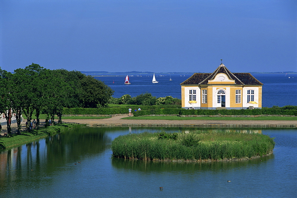 Lake and building by the coast, Valdemar Slot, Denmark, Scandinavia, Europe