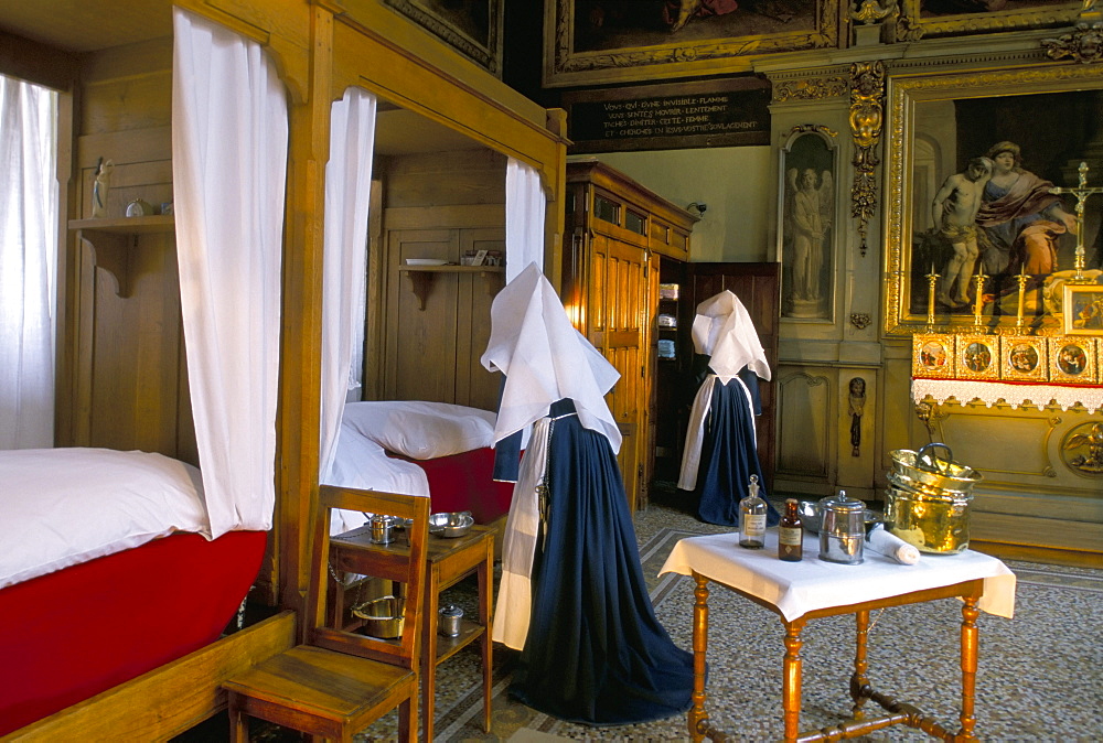 Tableau shows work of the nursing Sisters, Hotel Dieu, Beaune, Burgundy, France, Europe