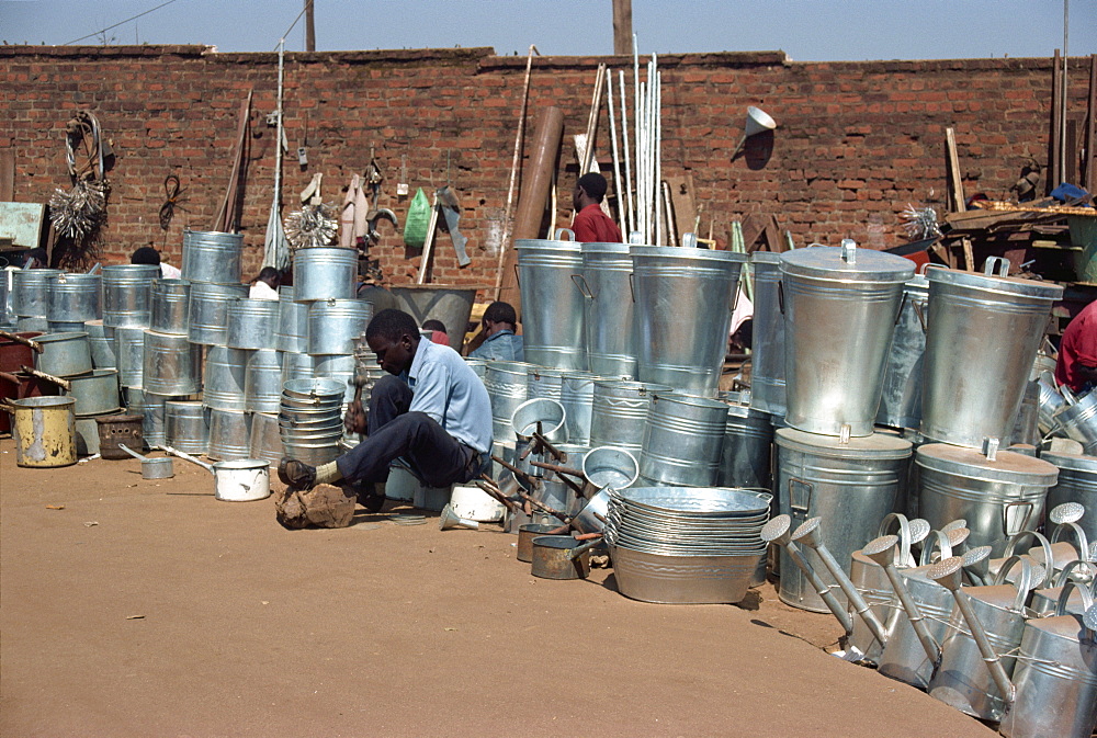 Tinsmiths in market, Lilongue, Malawi, Africa