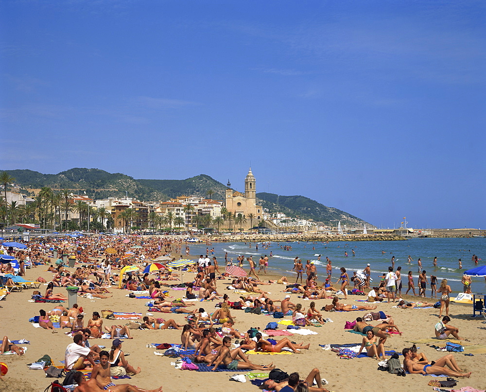 Crowded beach at Sitges, Costa Dorada, Cataluna, Spain, Europe