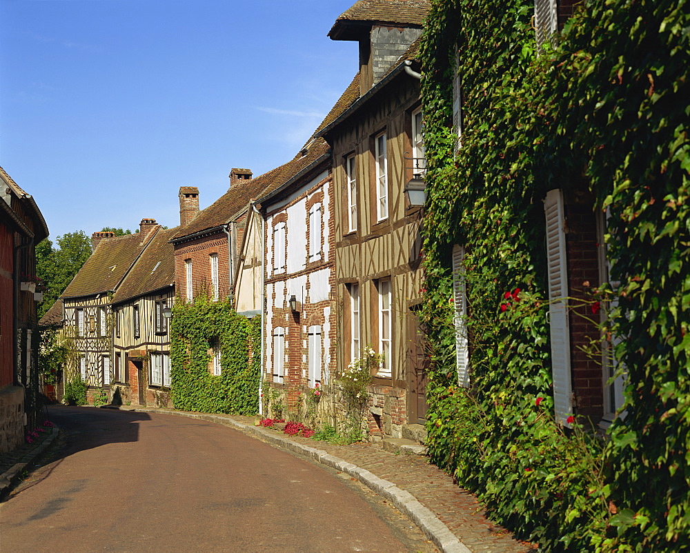 Houses line a quiet street at Gerberoy in Picardie, France, Europe