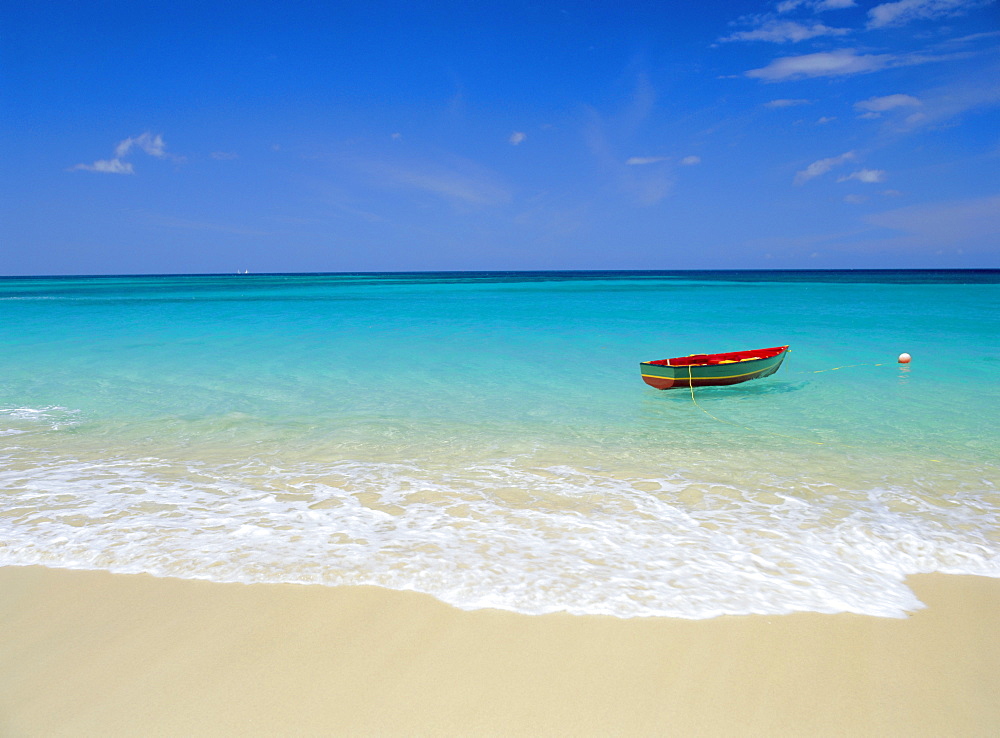 Boat moored near beach, Caribbean Sea, West Indies