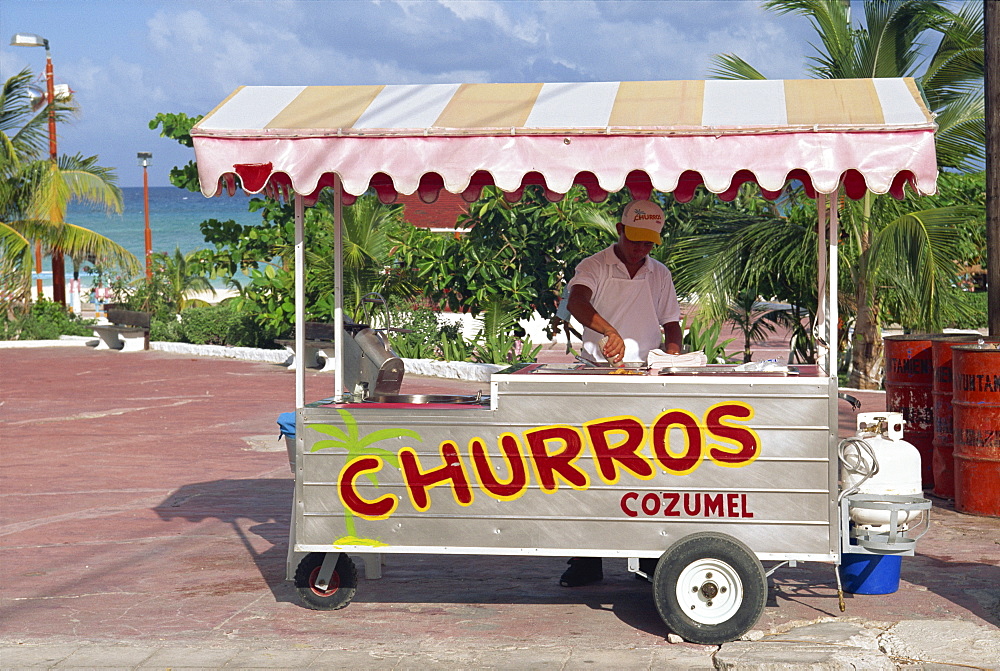 A churros seller, at Playa del Carmen, Mexico, North America