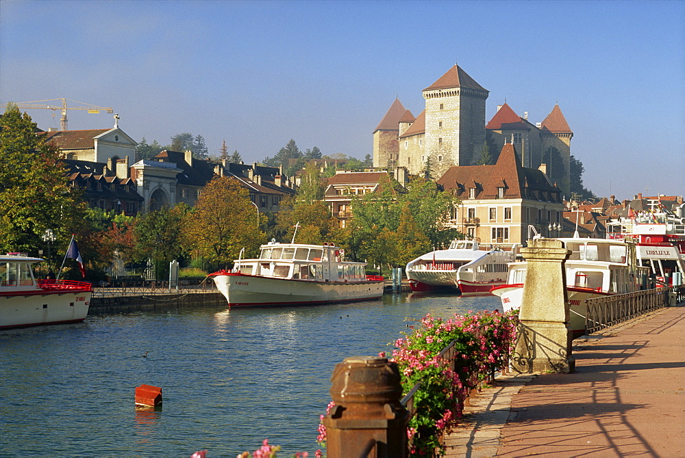 Boats moored along the river in the town of Annecy, Haute Savoie, Rhone Alpes, France, Europe