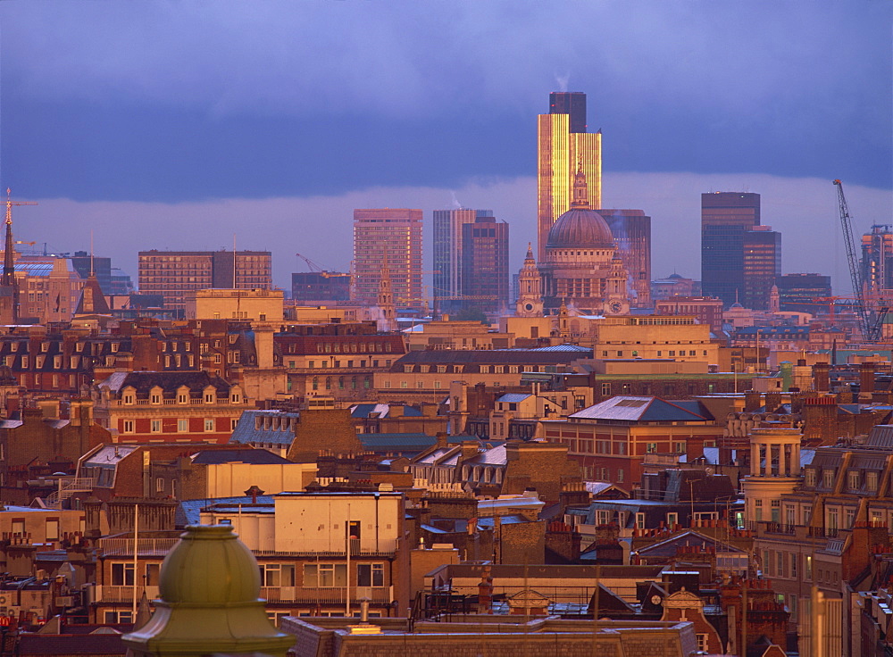 City skyline, including St. Paul's Cathedral and the NatWest Tower at dusk, London, England, United Kingdom, Europe