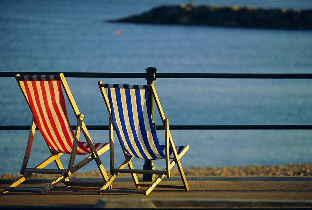 Two deckchairs on the seafront, Sidmouth, Devon, England, UK, Europe