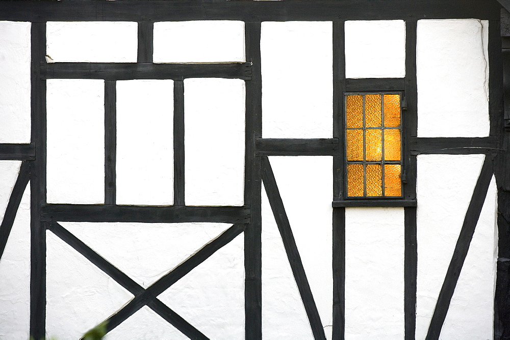 Old timber framed house with light in window, Chilham, Kent, England, United Kingdom, Europe