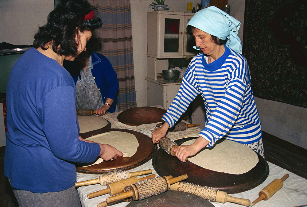 Making of Matsot for Passover in Jewish family, Bukhara, Uzbekistan, Central Asia, Asia