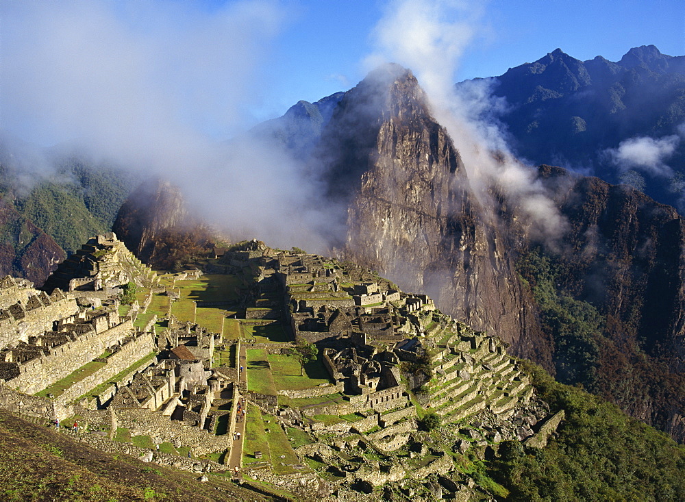 Clouds over the mountains behind the site of Machu Picchu, UNESCO World Heritage Site, Peru, South America