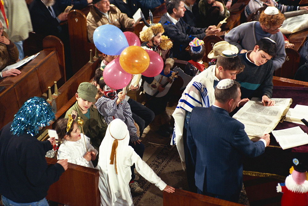 Reading of Esther Megila during the Purim Festival, Israel, Middle East