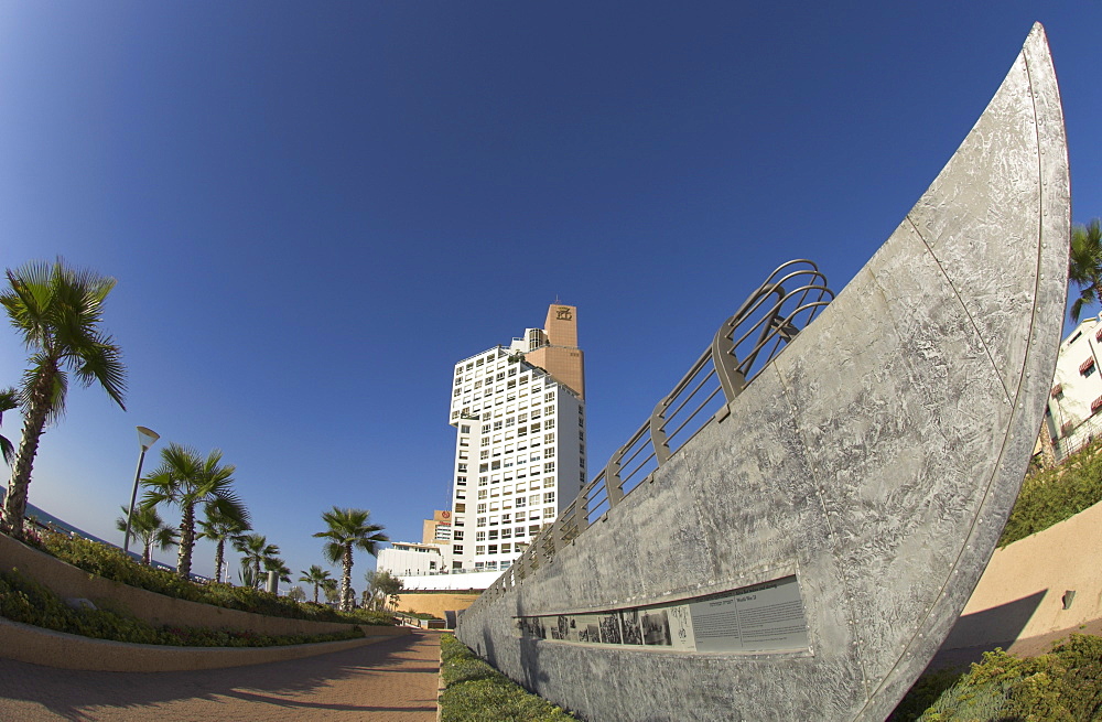 Public garden commemorating first migrants who reached Israel by sea, with memorial in shape of a boat and David tower in the background, London Square, Jaffa, Tel Aviv, Israel, Middle East