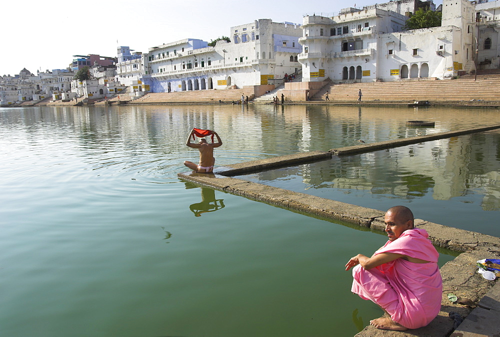 Pilgrim priests beside the sacred lake, where a lotus thrown by the Hindu god Brahma landed, Pushkar, Rajasthan state, India, Asia