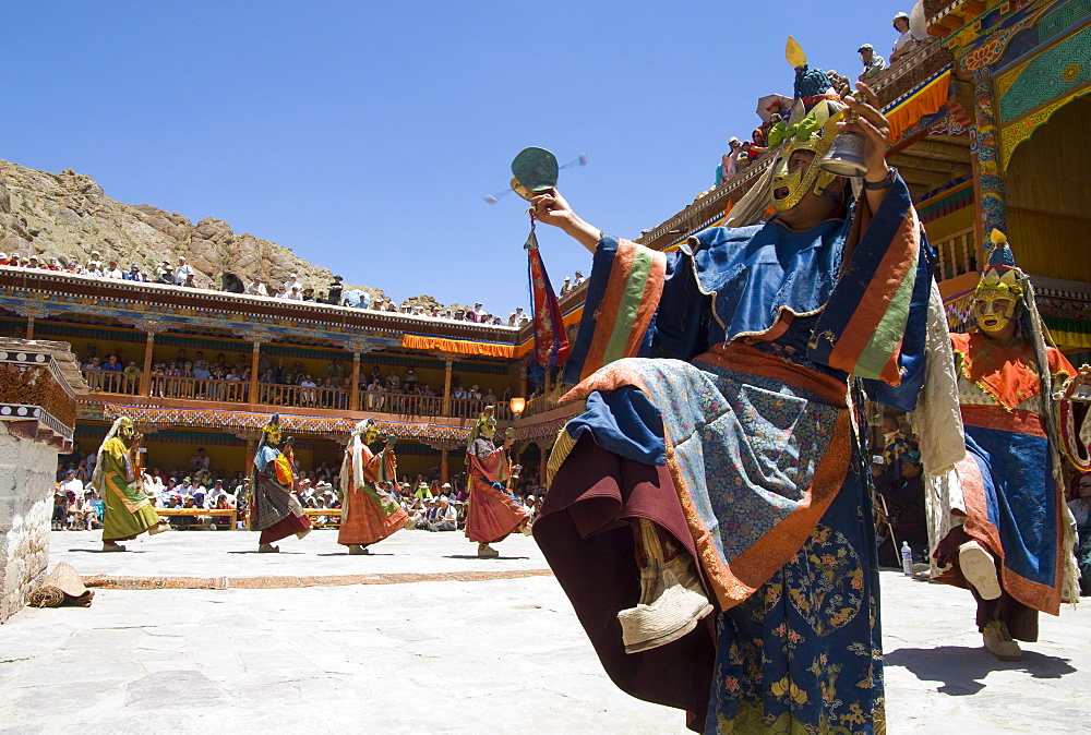 Close up of a monk dancing in full traditional costume in monastery courtyard, Hemis Festival, Hemis, Ladakh, India, Asia