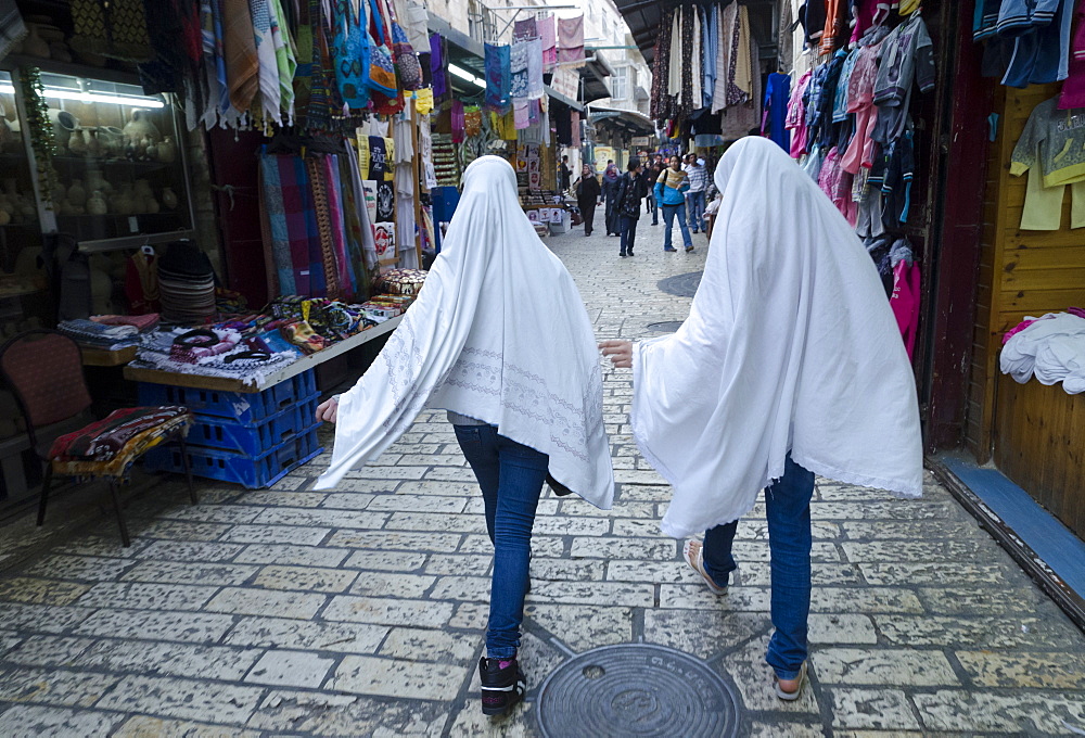 Two Palestinian female youngsters wearing a hijab on their way to pray, Old City, Jerusalem, Israel, Middle East