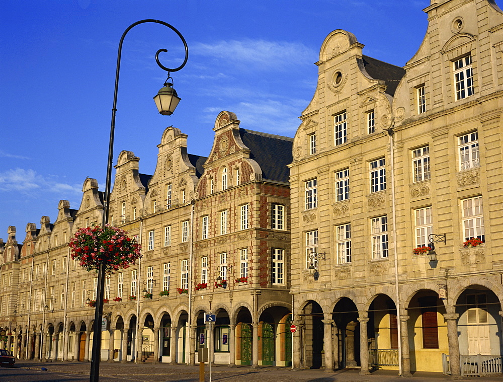 Colonnades of buildings in the town of Arras, Artois region, Nord Pas de Calais, France, Europe