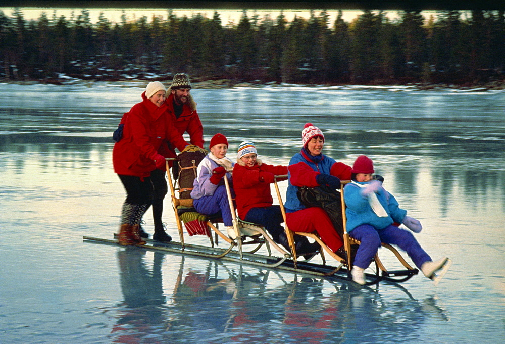 Quattro kick sledge on frozen Norwegian Lake, Norway, Scandinavia, Europe