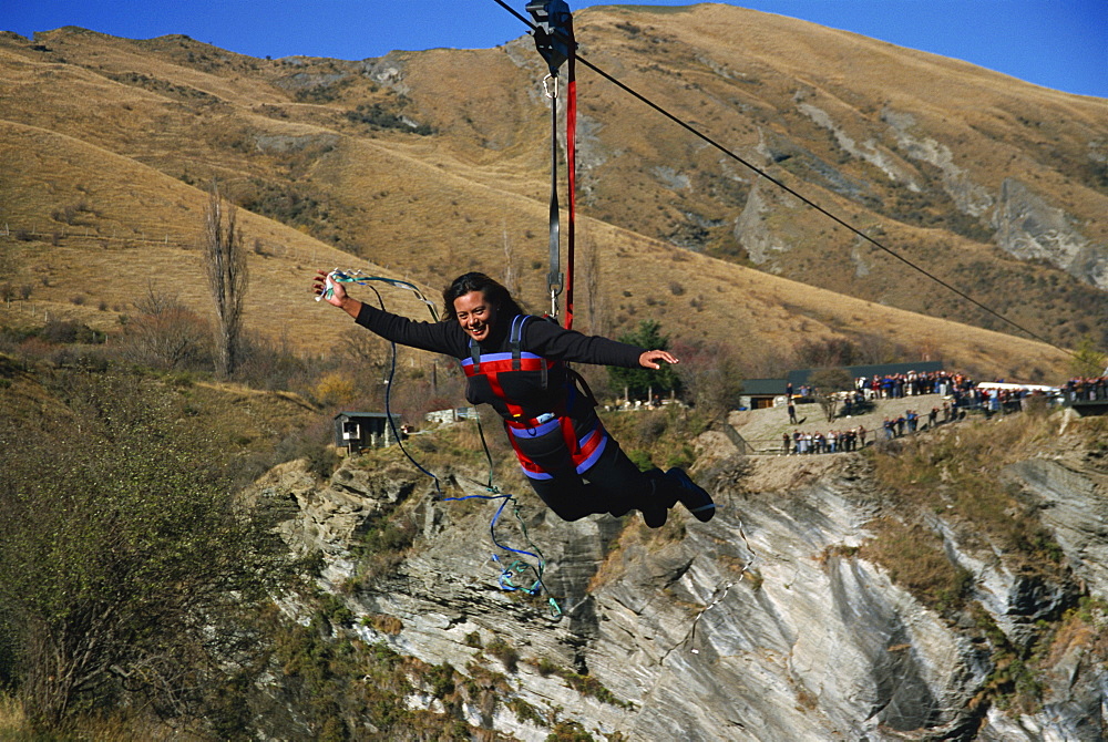 Flying fox, flying on wire over canyon, Queenstown, South Island, New Zealand, Pacific