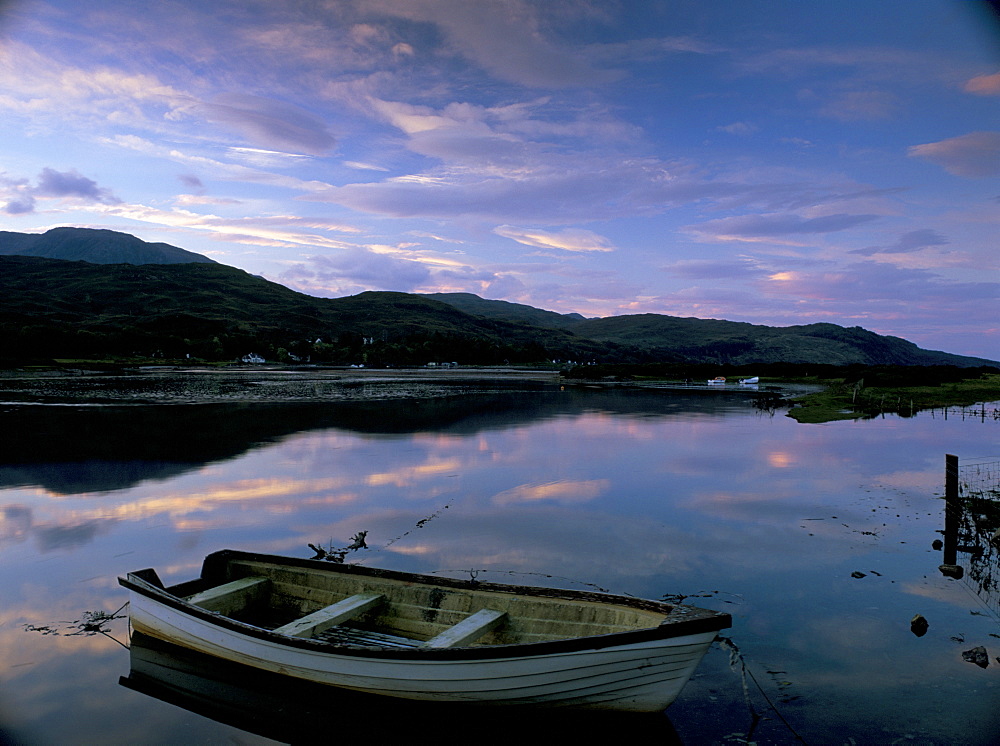 Dawn light over Glenelg, with rowing boat in the Glenelg River estuary during an unusually high tide, Glenelg, Highland region, Scotland, United Kingdom, Europe