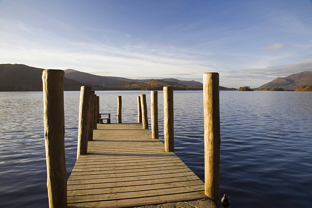 Wooden jetty at Barrow Bay landing on Derwent Water looking north west in autumn, Keswick, Lake District National Park, Cumbria, England, United Kingdom, Europe