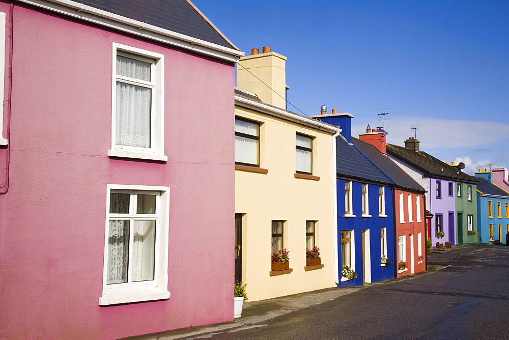 Row of colourful traditional houses in main street of historical village on Ring of Beara tourist route, Eyeries, Beara Peninsula, County Cork, Munster, Republic of Ireland, Europe