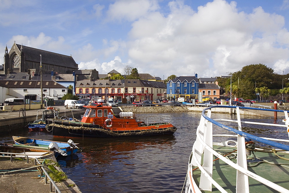 Lifeboat in harbour with town beyond, Castletown (Castletownbere) (Castletown Bearhaven), Beara Peninsula, County Cork, Munster, Republic of Ireland, Europe