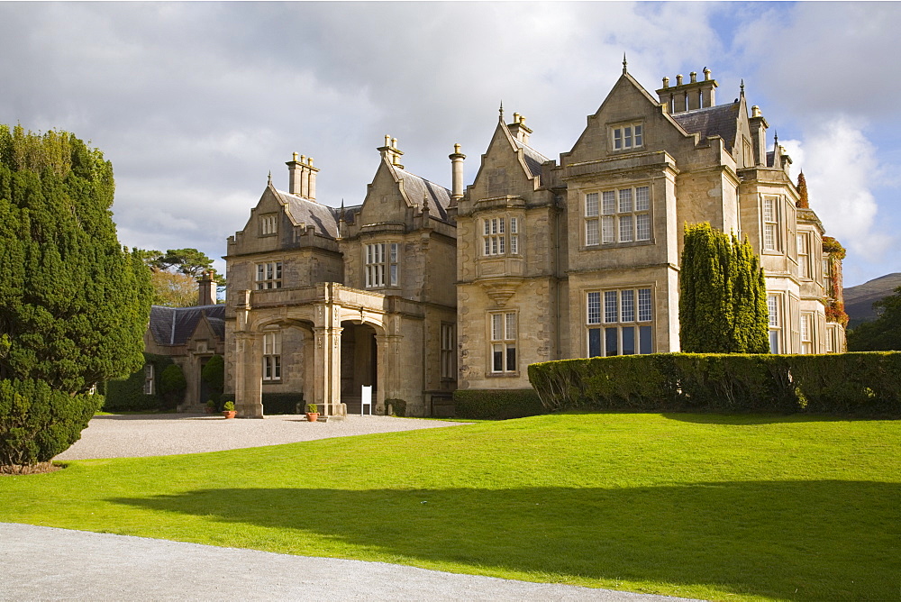 Front entrance and lawn of Muckross House built in 1843 in Victorian Tudor style by architect William Burn, Muckross Estate, Killarney National Park, County Kerry, Munster, Republic of Ireland, Europe