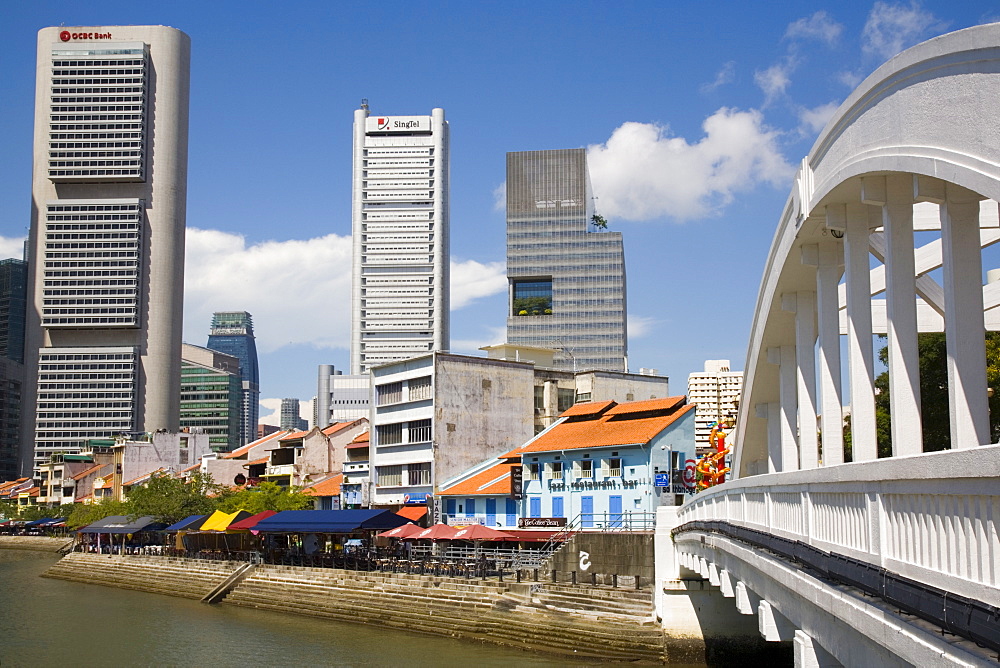 Elgin Bridge across River to bars and restaurants in historic shophouse buildings in Boat Quay Conservation Area, with Central Business District skyscrapers beyond, Singapore, Southeast Asia, Asia