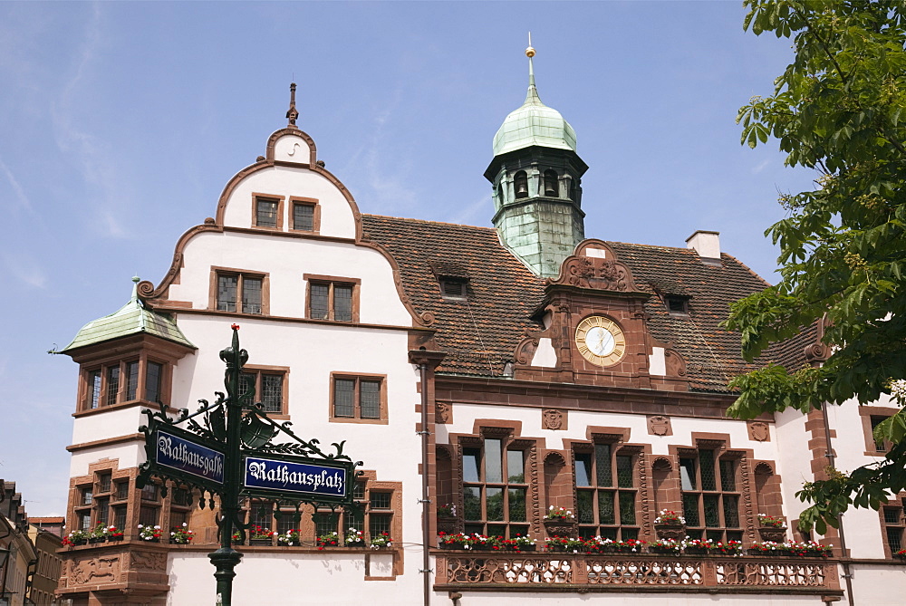 Ornate street sign and 16th century Altes Rathaus (Old City Hall) built 1559, Rathausgasse, Freiburg, Breisgau, Baden-Wurttemberg, Germany, Europe