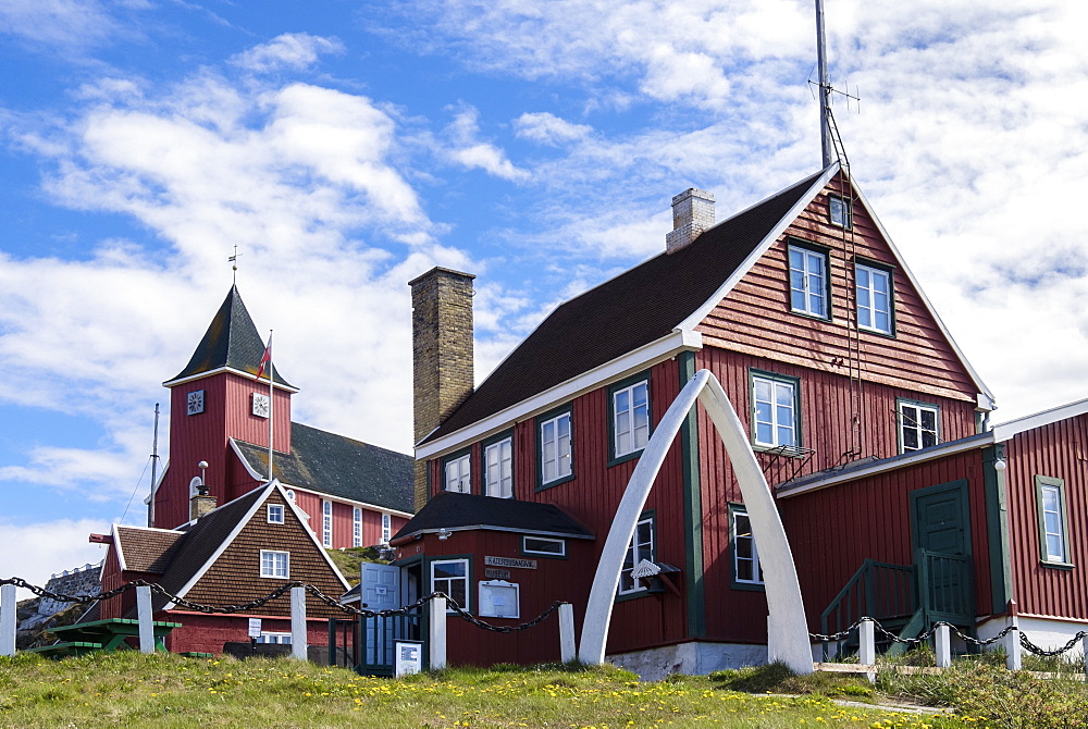 Colonial Manager's House 1846 and the new church with whalebone jaw arch, Sisimiut (Holsteinsborg), Qeqqata, Greenland, Polar Regions