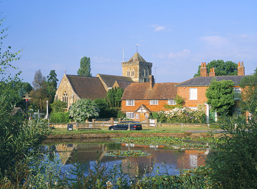 St. Mary's church, cottages and village sign, Chiddingfold, Haslemere, Surrey, England, United Kingdom, Europe