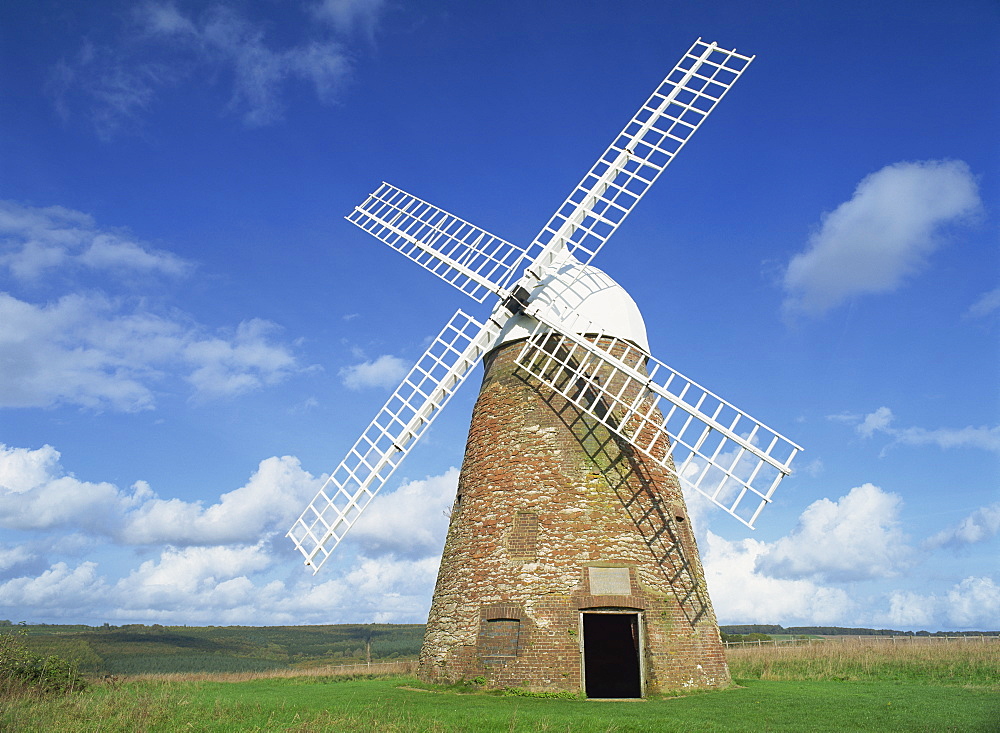 Halnaker Windmill, a restored 18th century brick tower mill, on top of Halnaker Hill in South Downs, Halnaker, West Sussex, England, United Kingdom, Europe