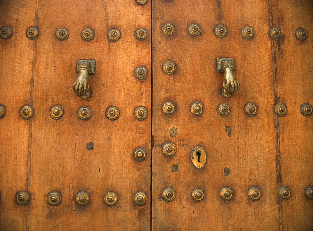 Detail of old door with hand of Fatima doorknockers, Ronda, Andalucia, Spain, Europe